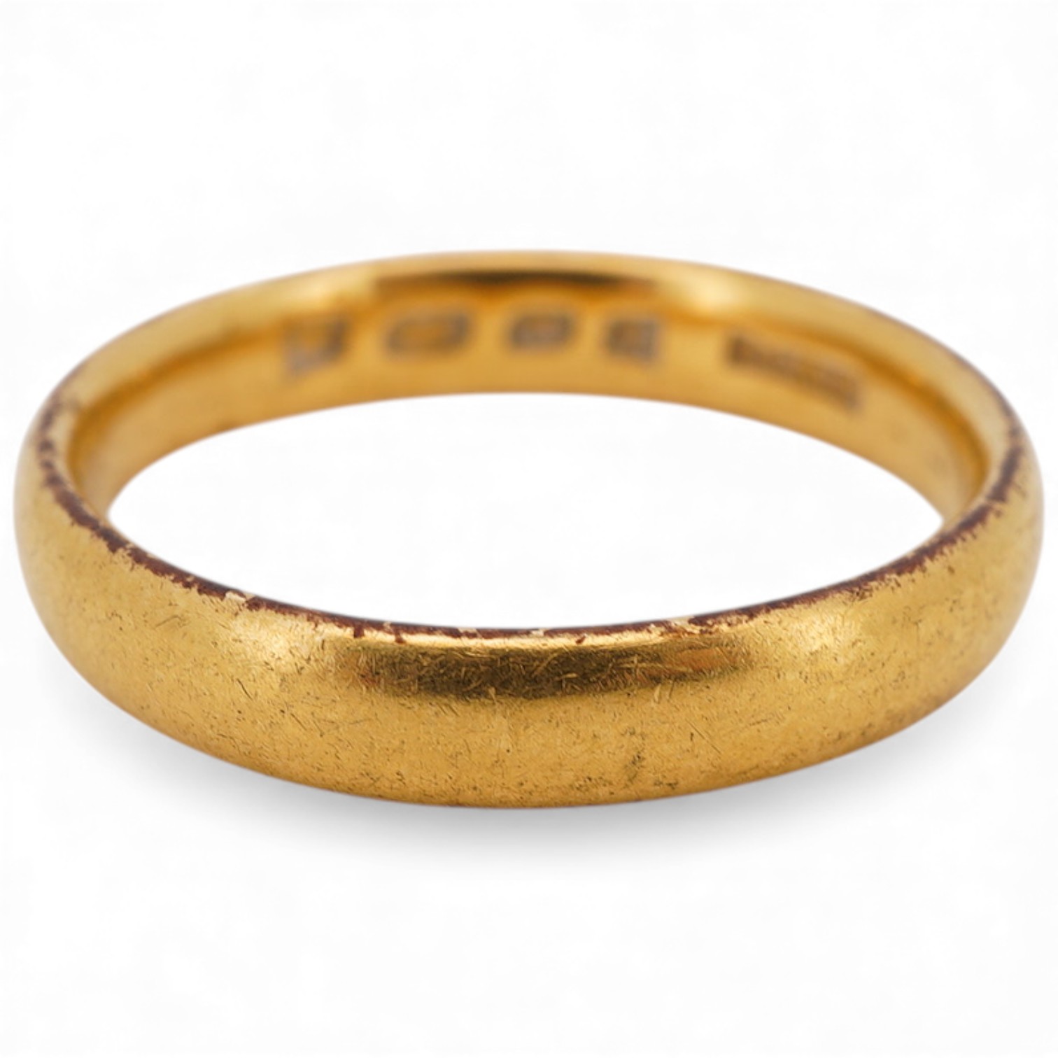 A George V 22ct gold wedding band, London, 1924, size L, 3.8 grams.